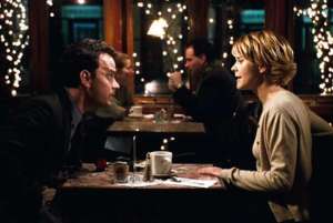Frank and Kathleen across table in You've Got Mail